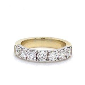 14K Geelgouden alliancering met 7x 0.20crt  VVS Top Wesselton