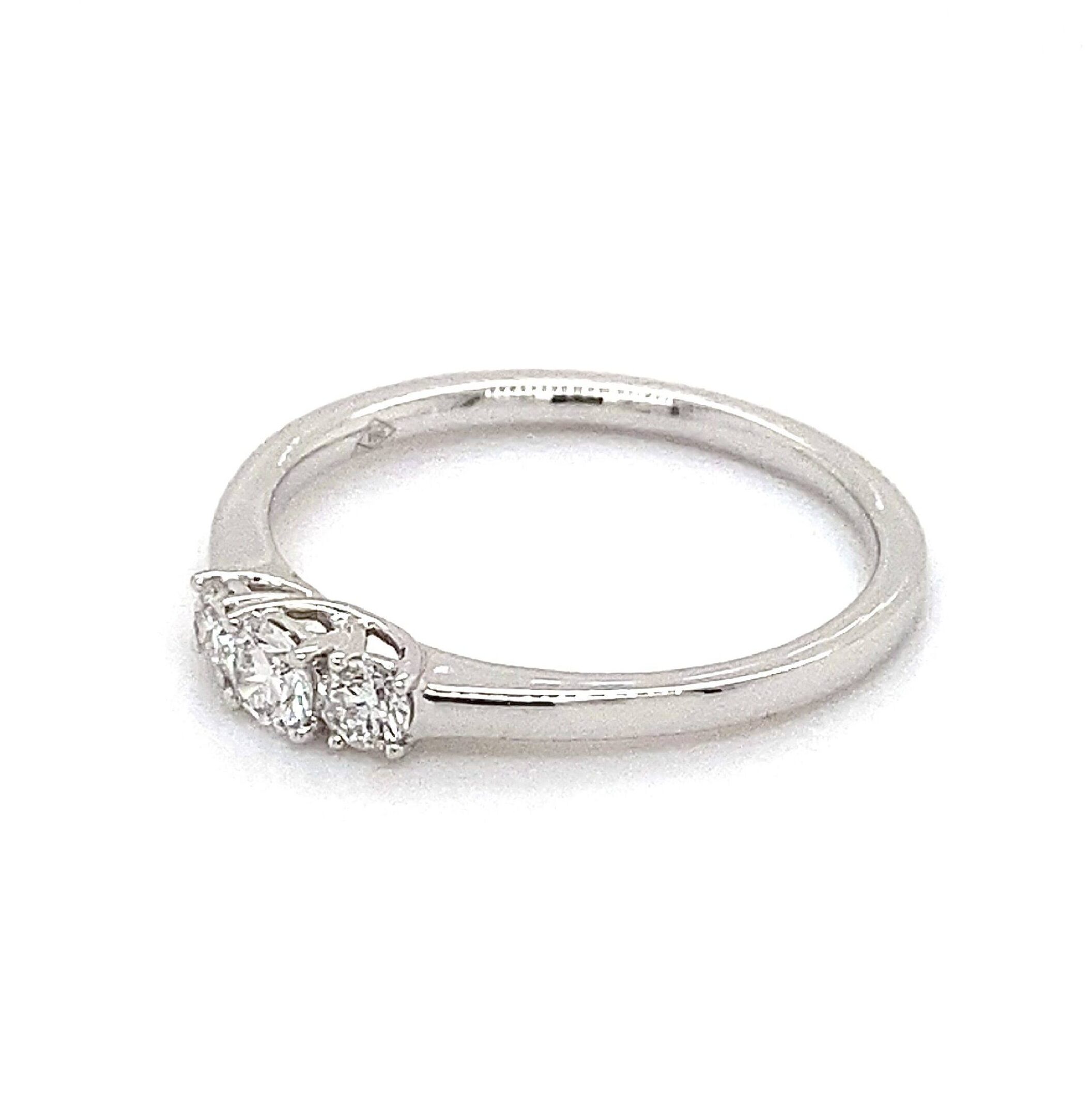 Ring "Trilogy"18K goud 0.30crt SI H