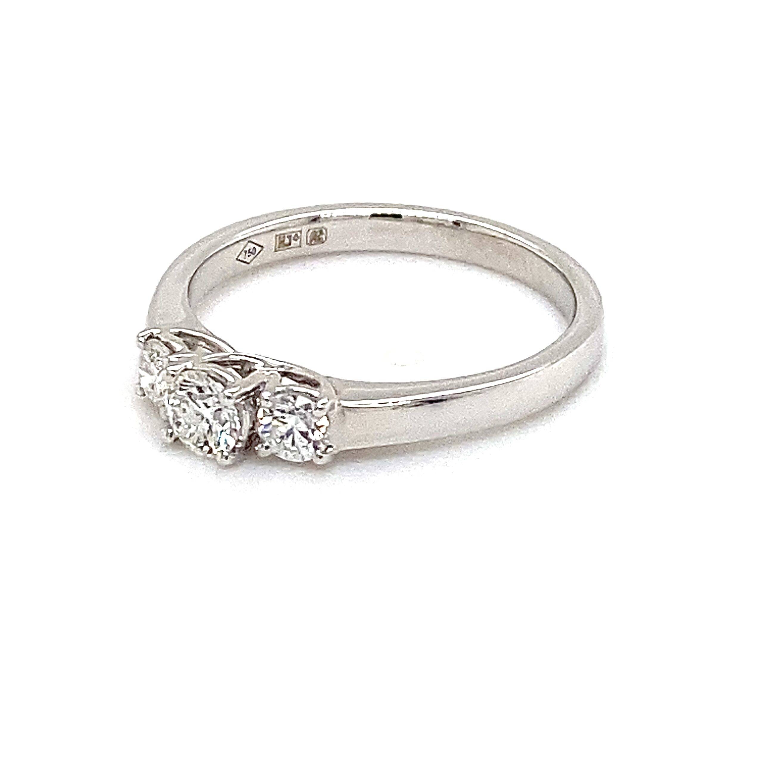 Ring "Trilogy"18K goud 0.50crt SI H